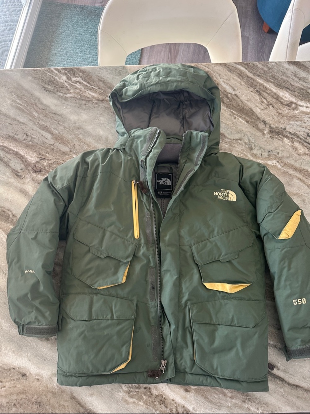 The North Face Kids Olive Green Puffer Jacket with Yellow Accents